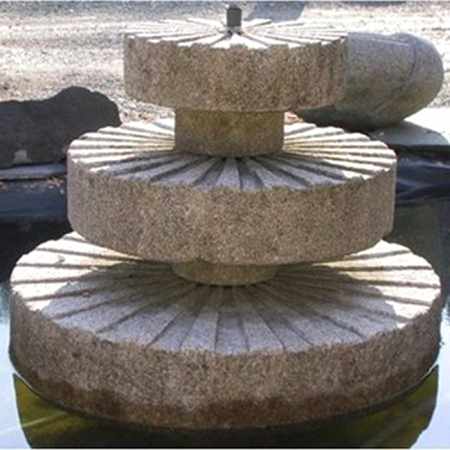 Wasserspiel Mühlsteine Fengshui Garten